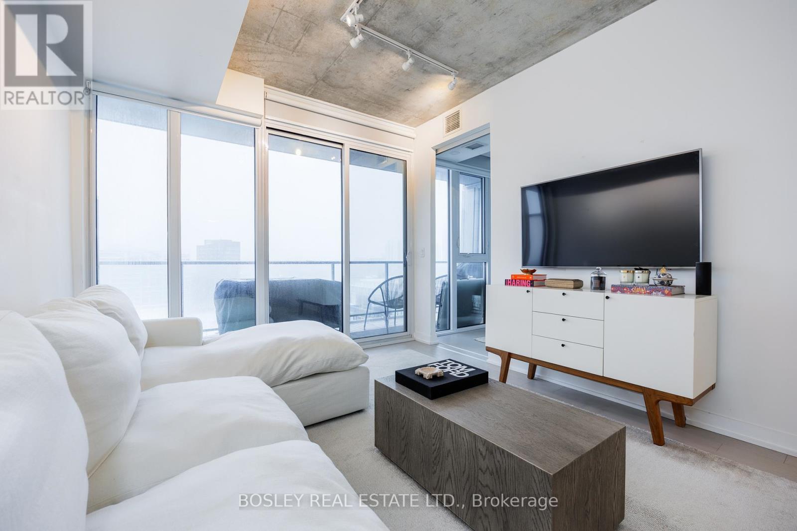 1210 - 15 Baseball Place, Toronto, ON - Indoor Photo Showing Living Room