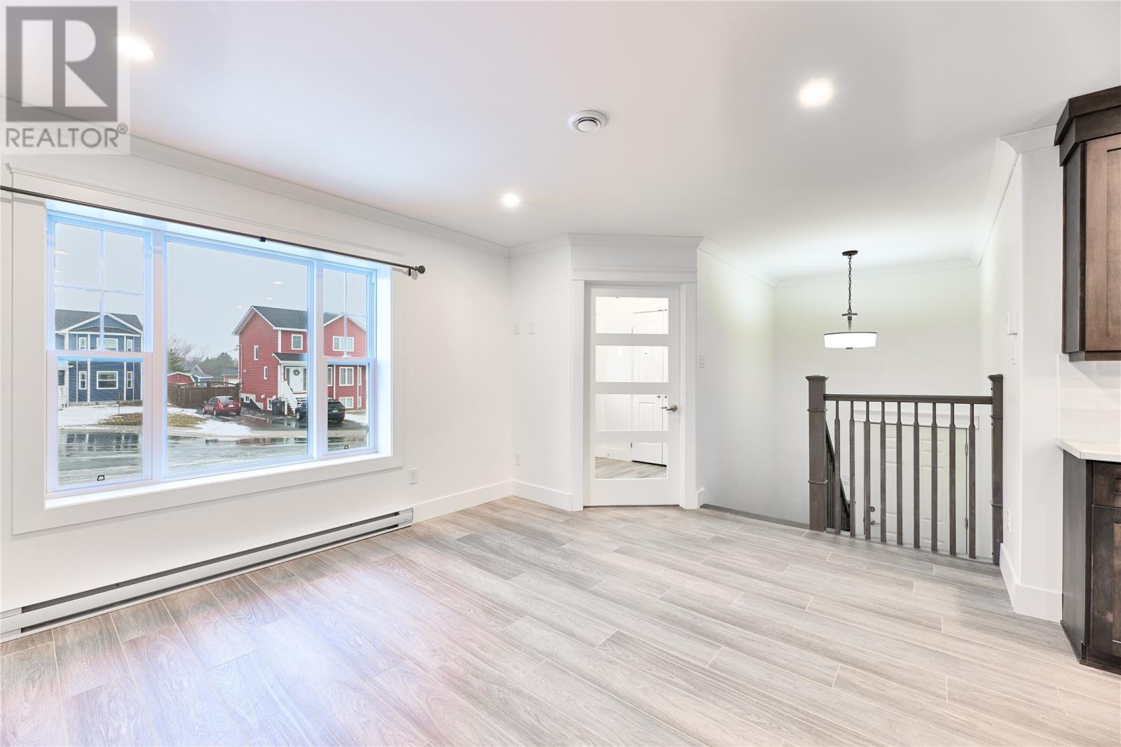 11 Meagher Place, Conception Bay South, NL - Indoor Photo Showing Other Room With Fireplace