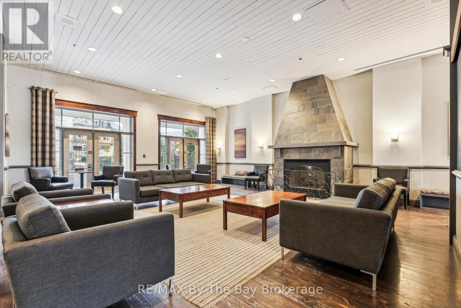 317 - 170 Jozo Weider Boulevard, Blue Mountains, ON - Indoor Photo Showing Living Room With Fireplace