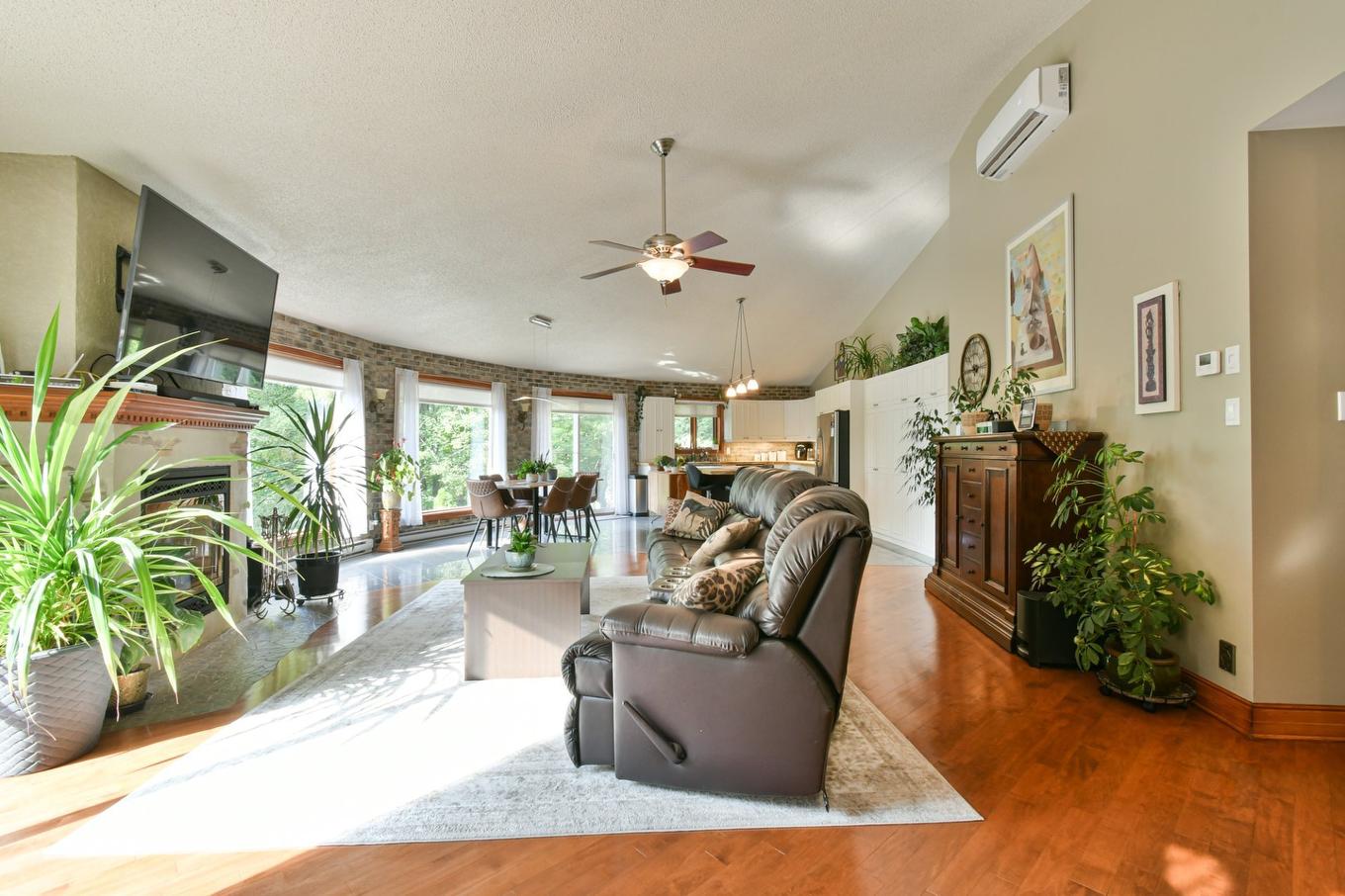 Living room - 744 Rue De Fribourg, Sainte-Adèle, QC - Indoor With Fireplace