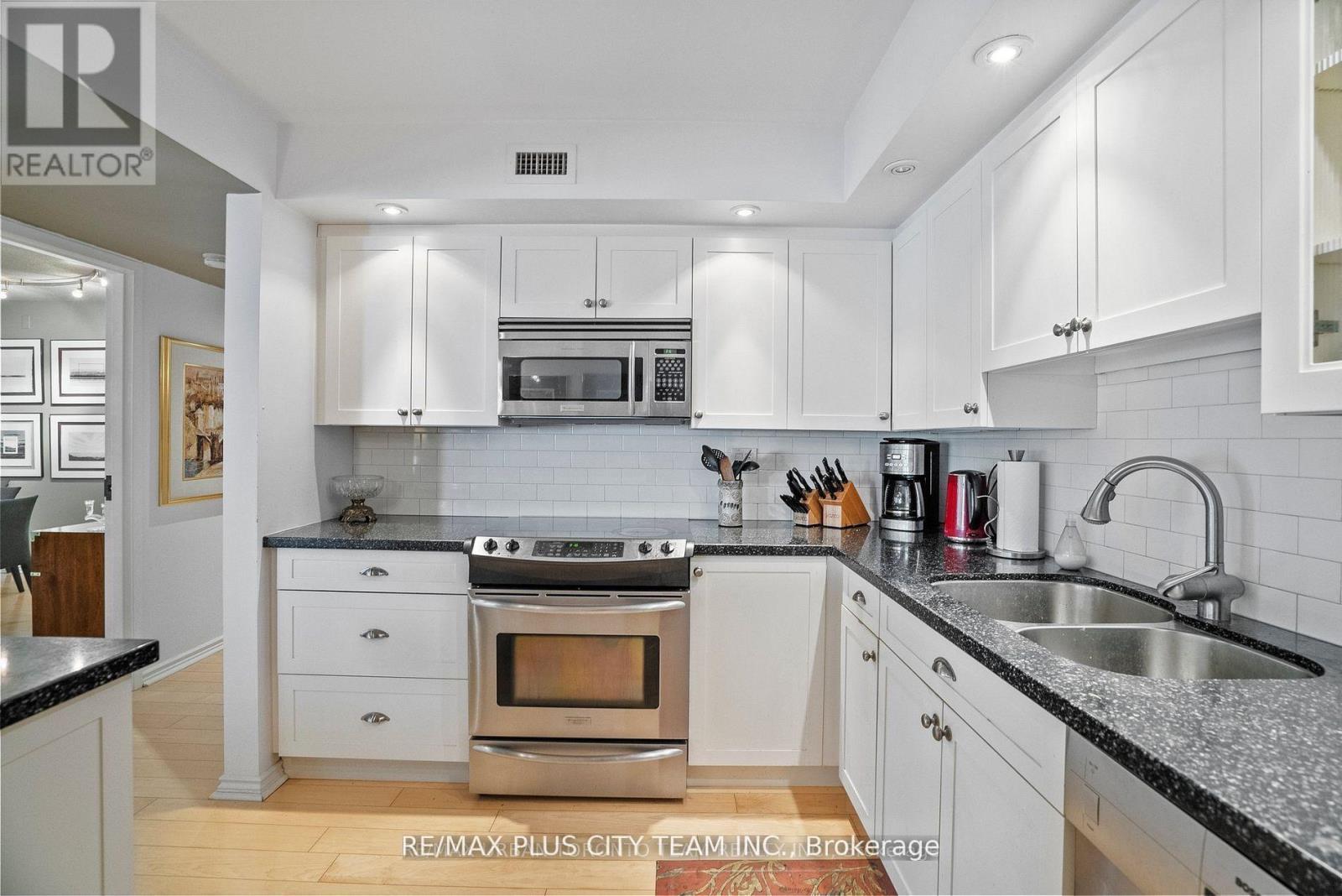 707 - 251 Queens Quay W, Toronto, ON - Indoor Photo Showing Kitchen With Double Sink