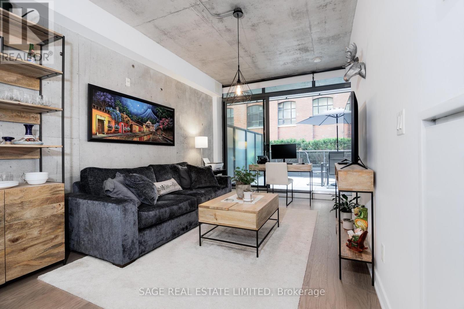 207 - 90 Broadview Avenue, Toronto, ON - Indoor Photo Showing Living Room