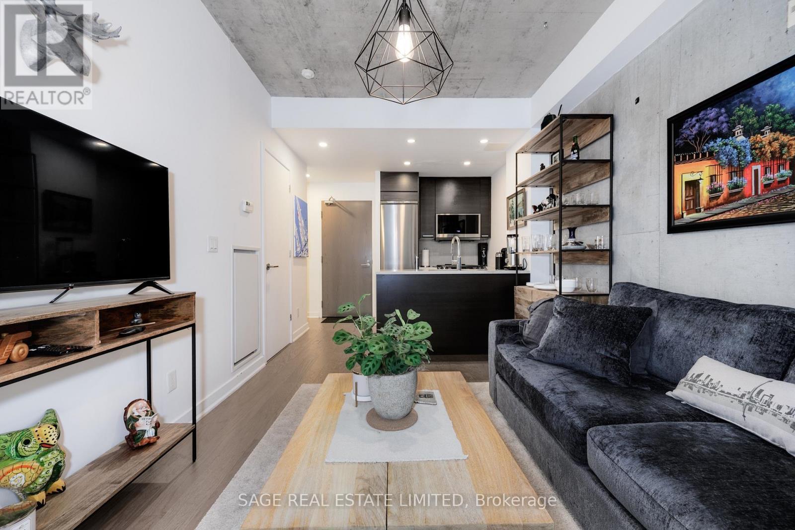 207 - 90 Broadview Avenue, Toronto, ON - Indoor Photo Showing Living Room
