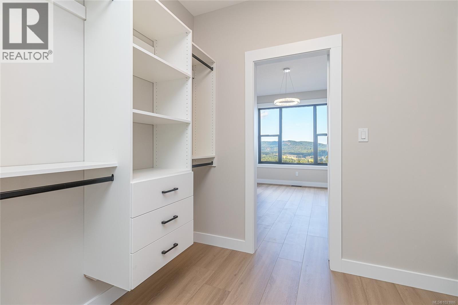 Spacious closet of primary bedroom - 3195 Woodrush Dr, Duncan, BC - Indoor