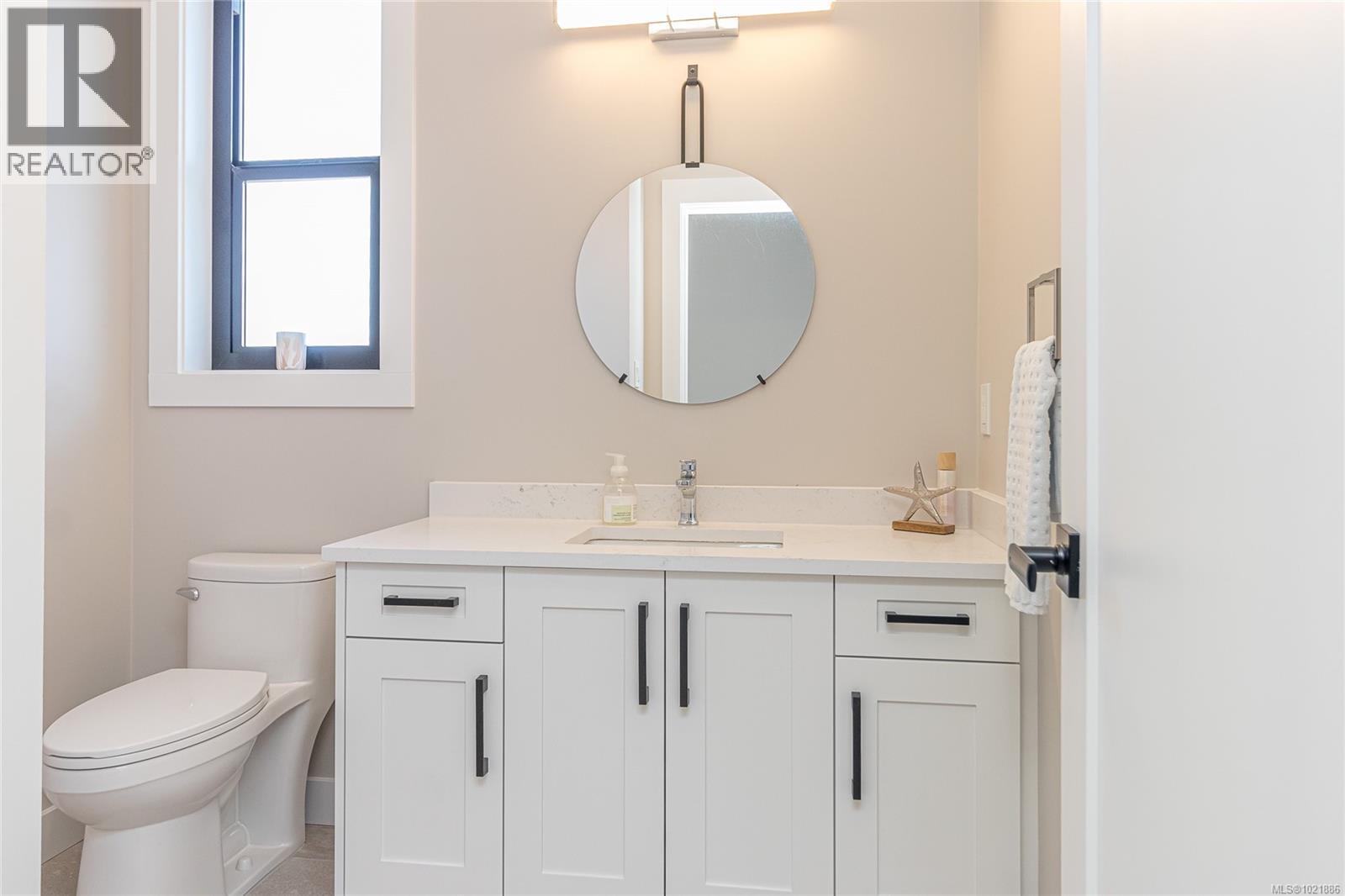 Bathroom with vanity and toilet - 3195 Woodrush Dr, Duncan, BC - Indoor Photo Showing Bathroom
