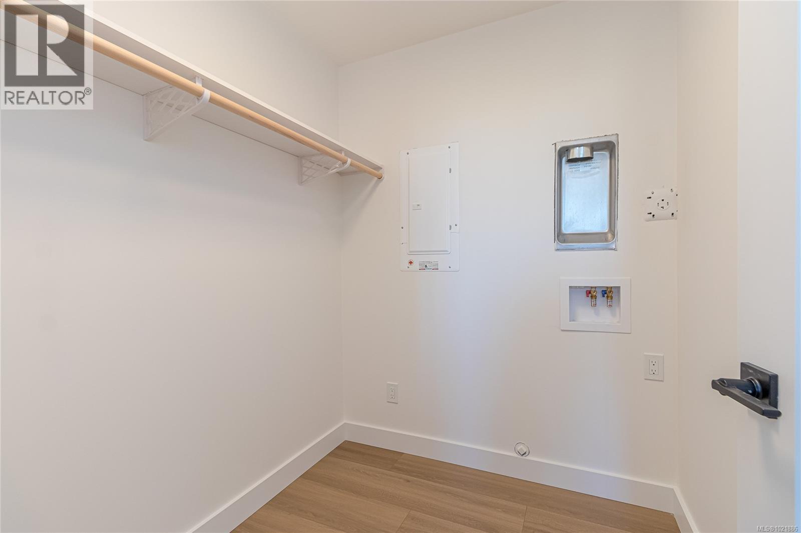 Closet of suite, with laundry hookups - 3195 Woodrush Dr, Duncan, BC - Indoor