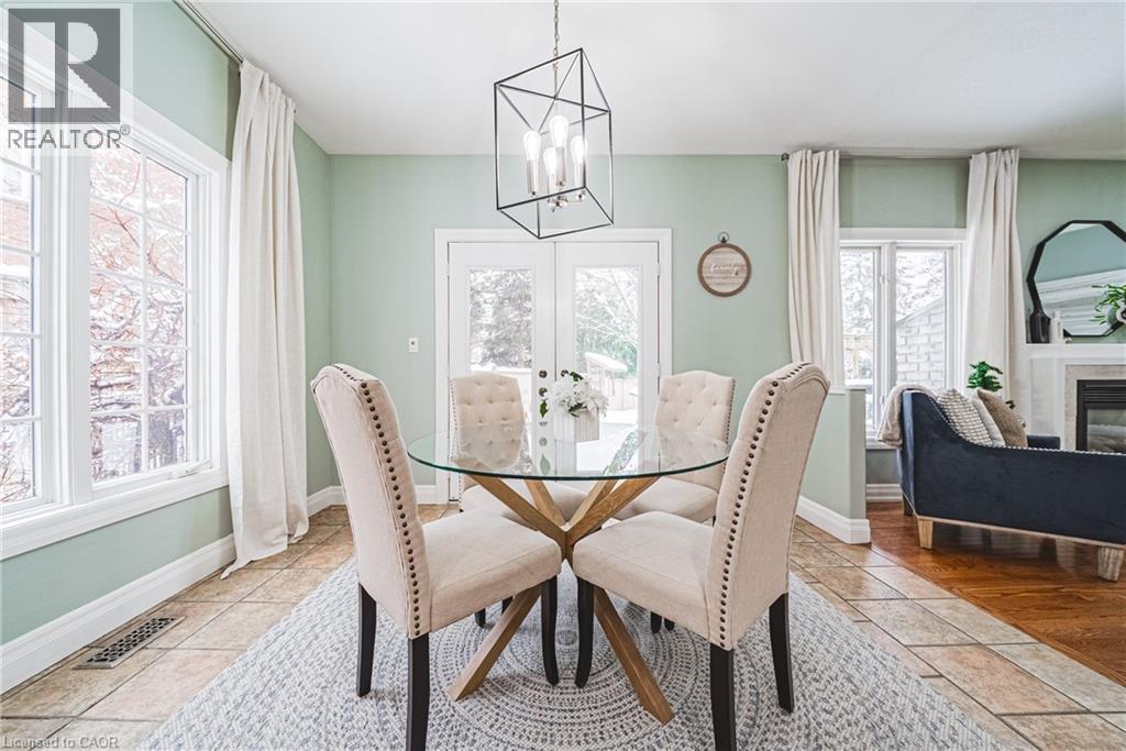 18 Palomino Drive, Carlisle, ON - Indoor Photo Showing Dining Room With Fireplace