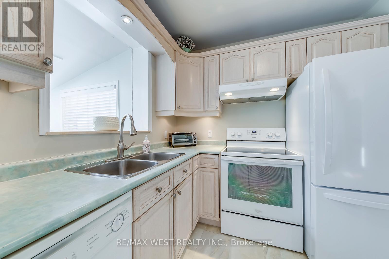 709 Glengrove Avenue, Toronto, ON - Indoor Photo Showing Kitchen With Double Sink