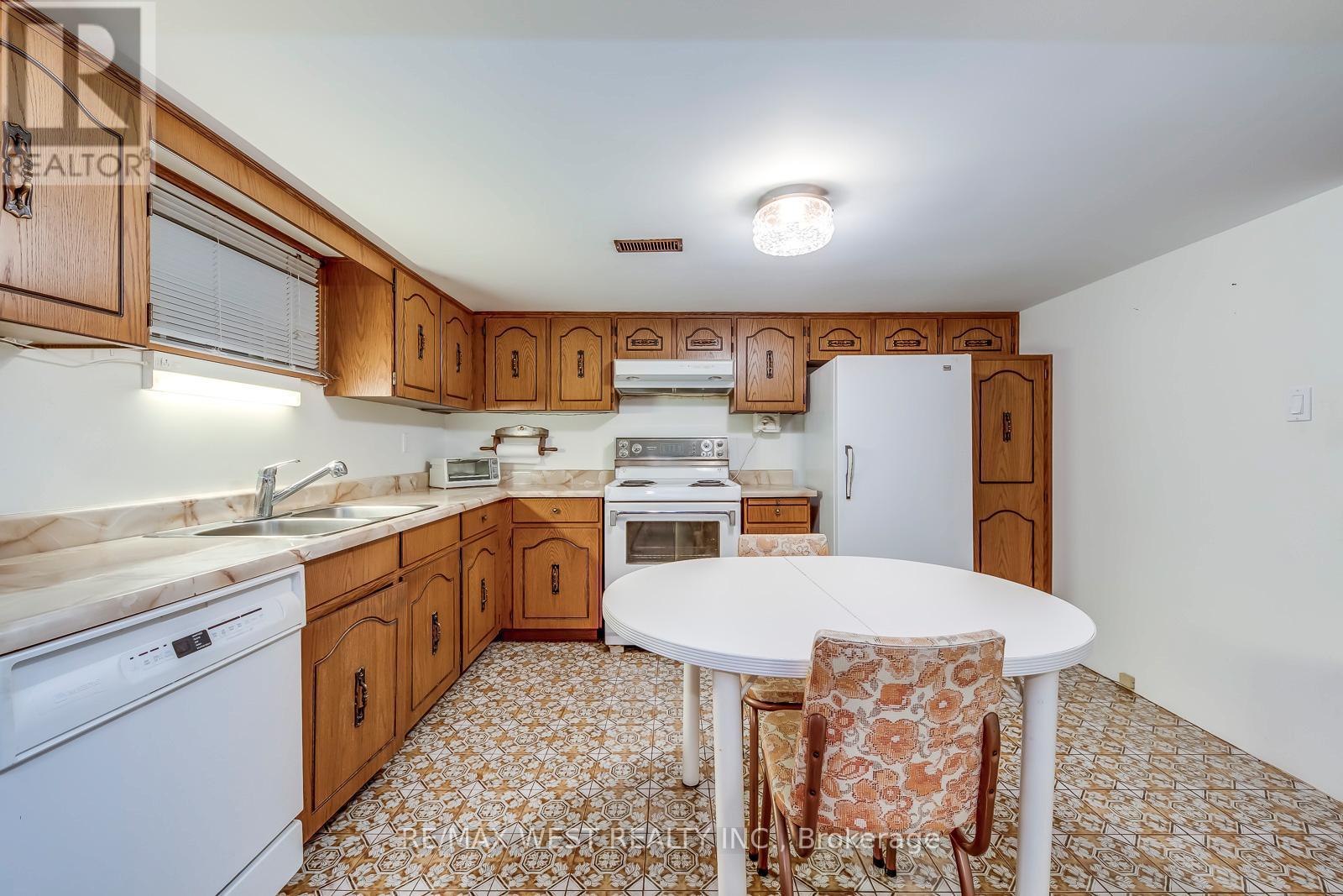 709 Glengrove Avenue, Toronto, ON - Indoor Photo Showing Kitchen With Double Sink