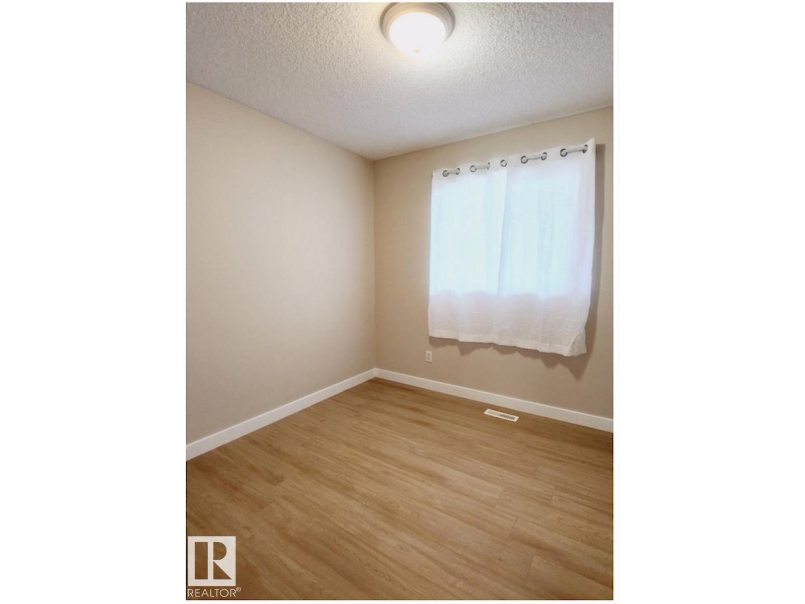 #47 16728 115 St Nw, Edmonton, AB - Indoor Photo Showing Other Room