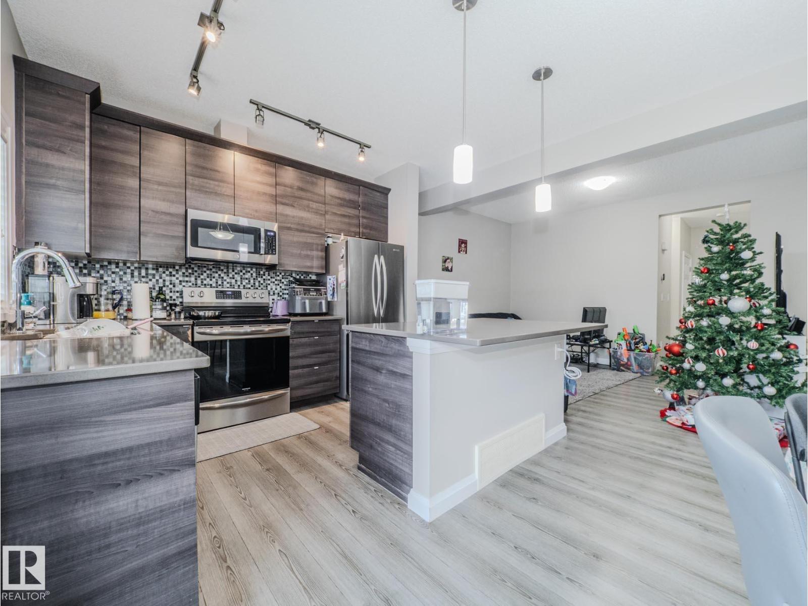 #14 3710 Allan Dr Sw, Edmonton, AB - Indoor Photo Showing Kitchen With Stainless Steel Kitchen With Upgraded Kitchen