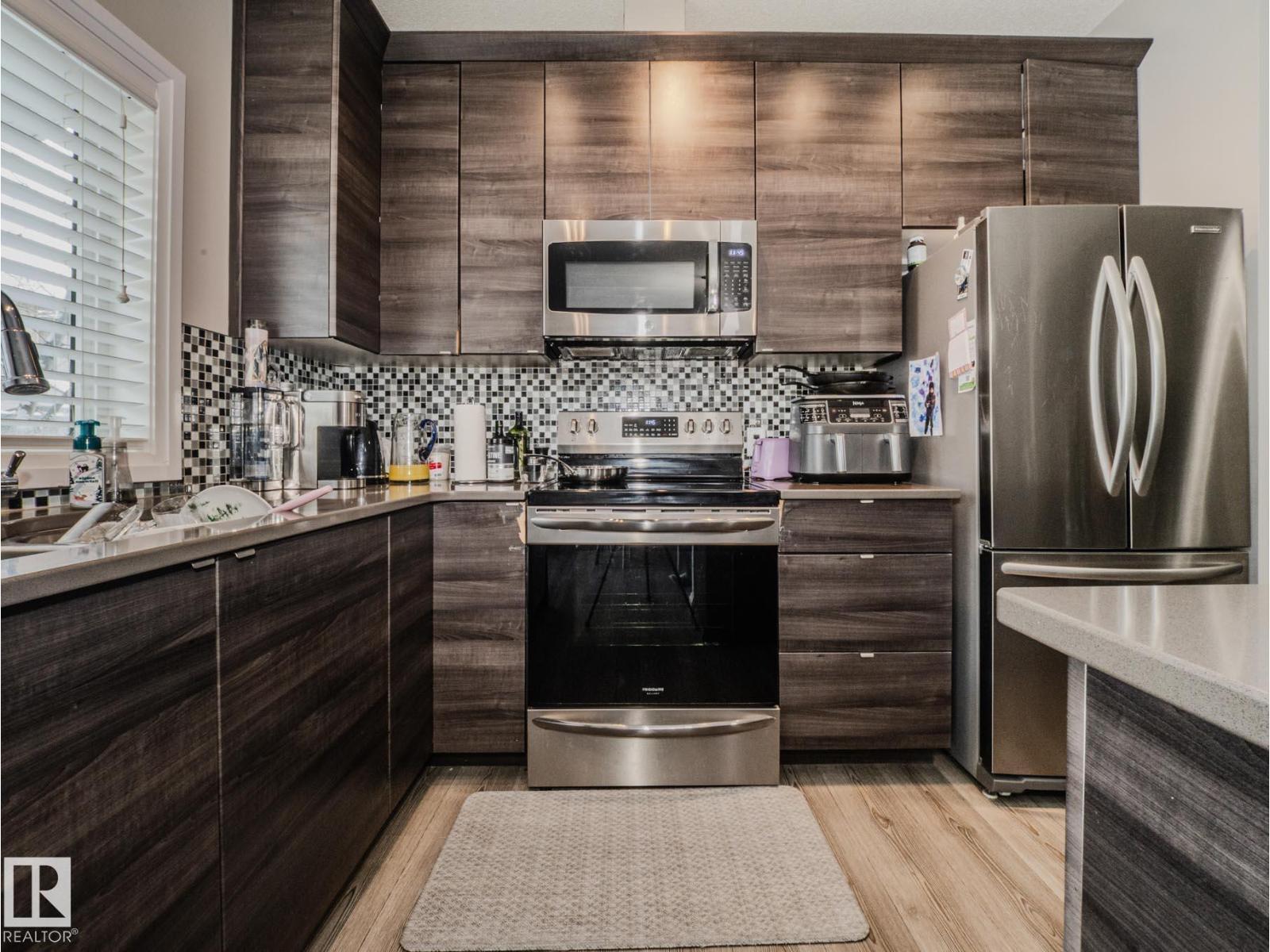 #14 3710 Allan Dr Sw, Edmonton, AB - Indoor Photo Showing Kitchen With Stainless Steel Kitchen With Upgraded Kitchen