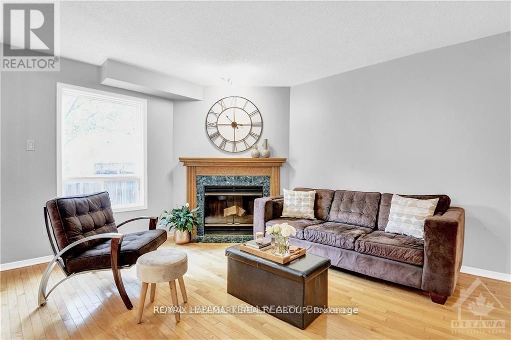 133 Woodpark Way, Ottawa, ON - Indoor Photo Showing Living Room With Fireplace