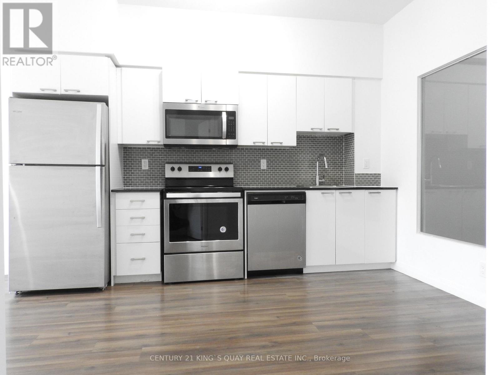 909 - 2150 Lawrence Avenue E, Toronto, ON - Indoor Photo Showing Kitchen With Stainless Steel Kitchen