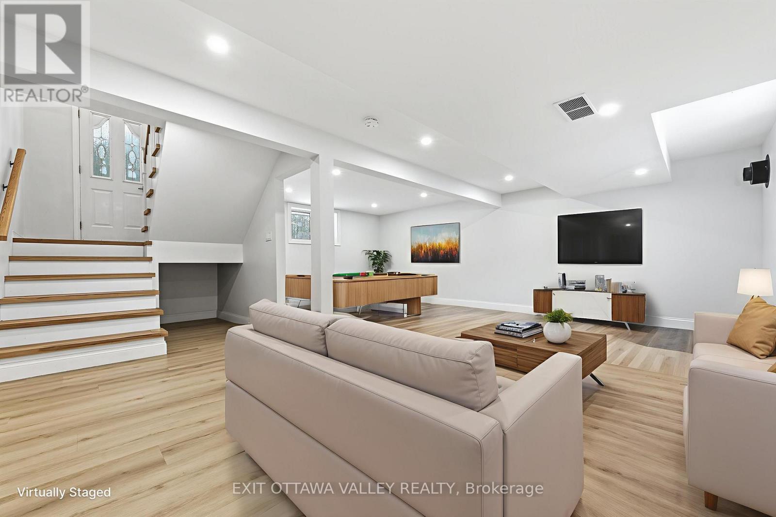 Virtually staged rec room - alternate angle - 1251 Wylie Road, Laurentian Hills, ON - Indoor Photo Showing Other Room