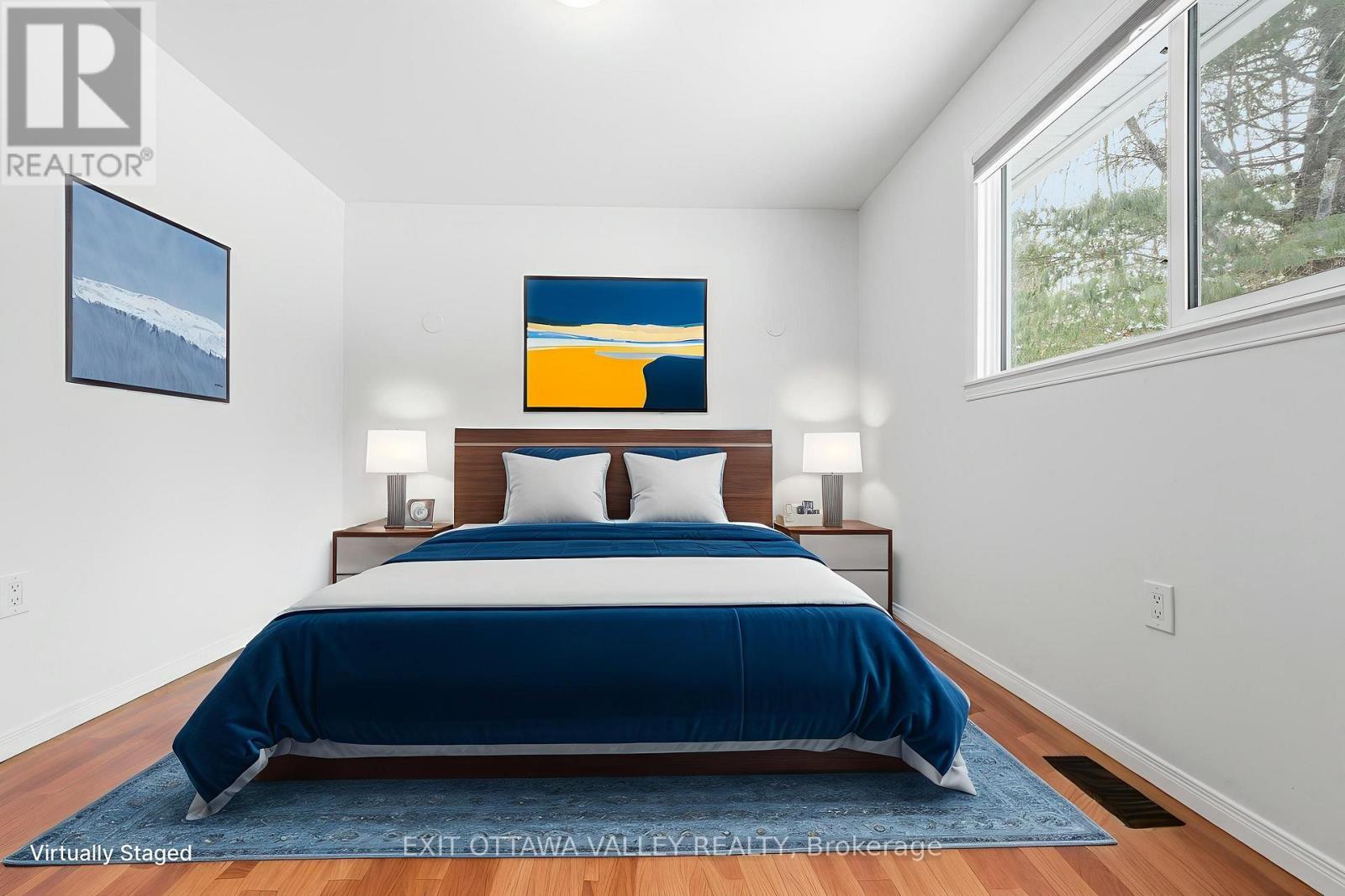 Virtually staged primary bedroom - 1251 Wylie Road, Laurentian Hills, ON - Indoor Photo Showing Bedroom