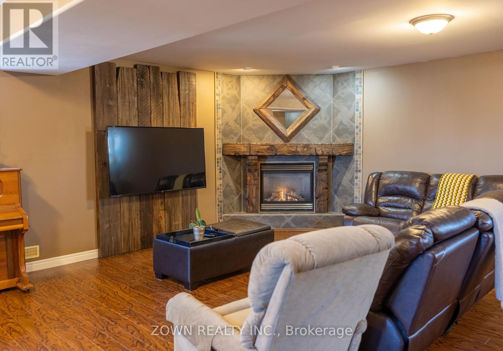 1433 Girard Drive, Lakeshore, ON - Indoor Photo Showing Living Room With Fireplace