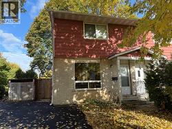 Colonial house with brick siding -