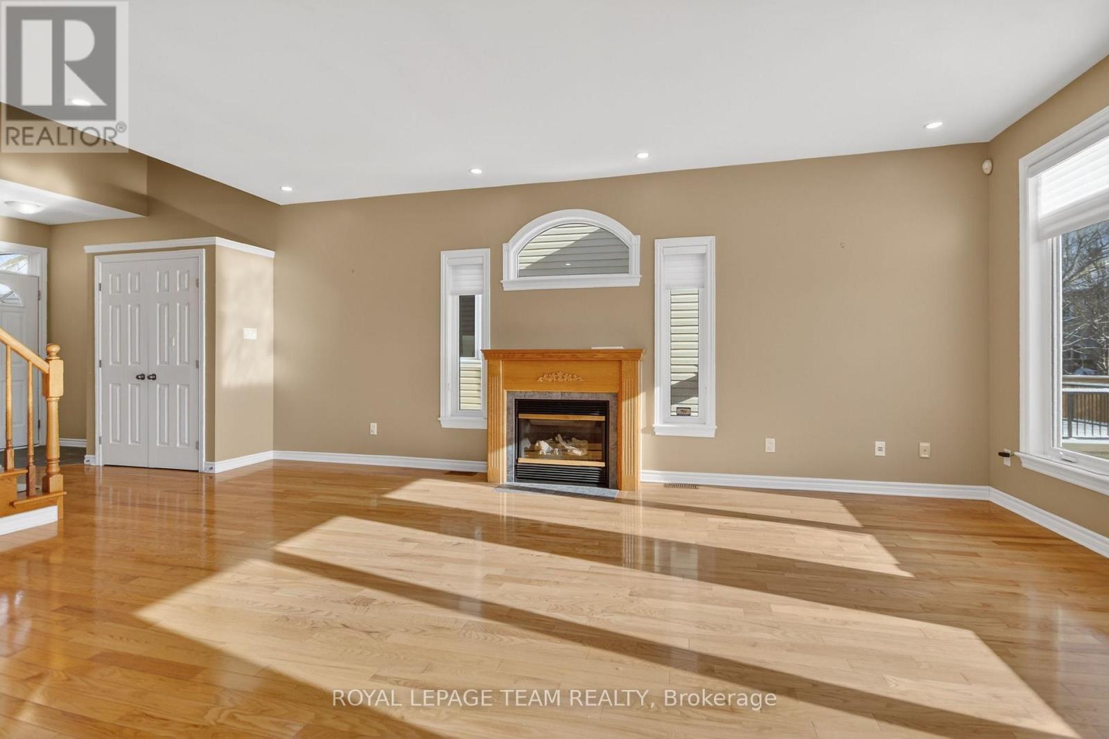 Living Room - 59 Polo Lane, Ottawa, ON - Indoor Photo Showing Living Room With Fireplace