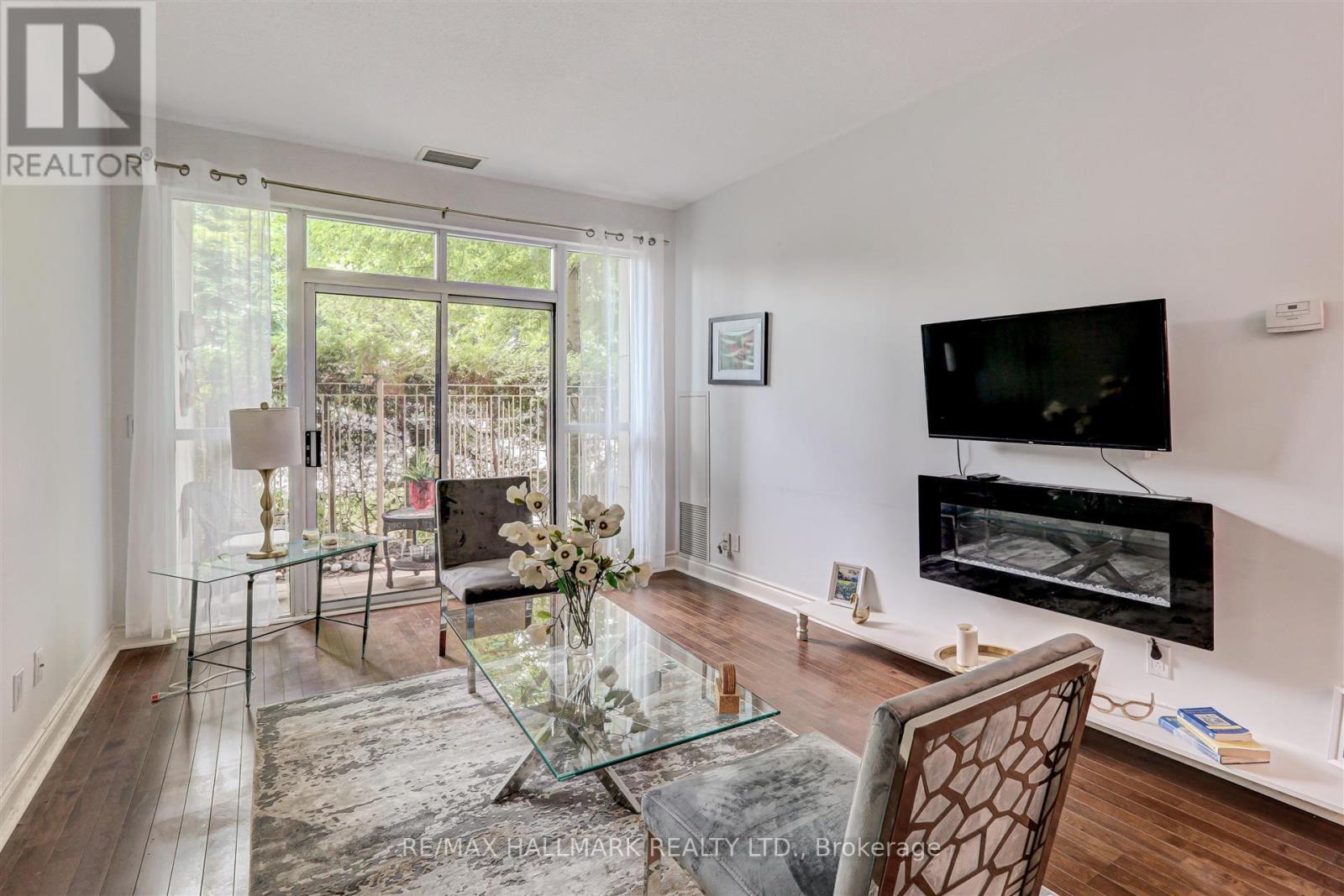 102 - 319 Merton Street, Toronto, ON - Indoor Photo Showing Living Room With Fireplace
