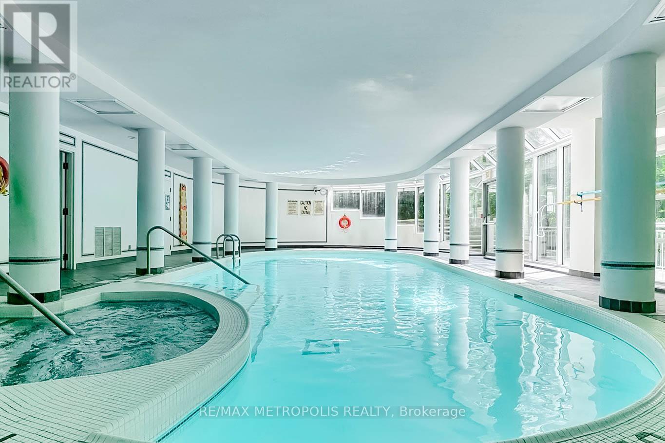 201 - 1 Watergarden Way, Toronto, ON - Indoor Photo Showing Other Room With In Ground Pool