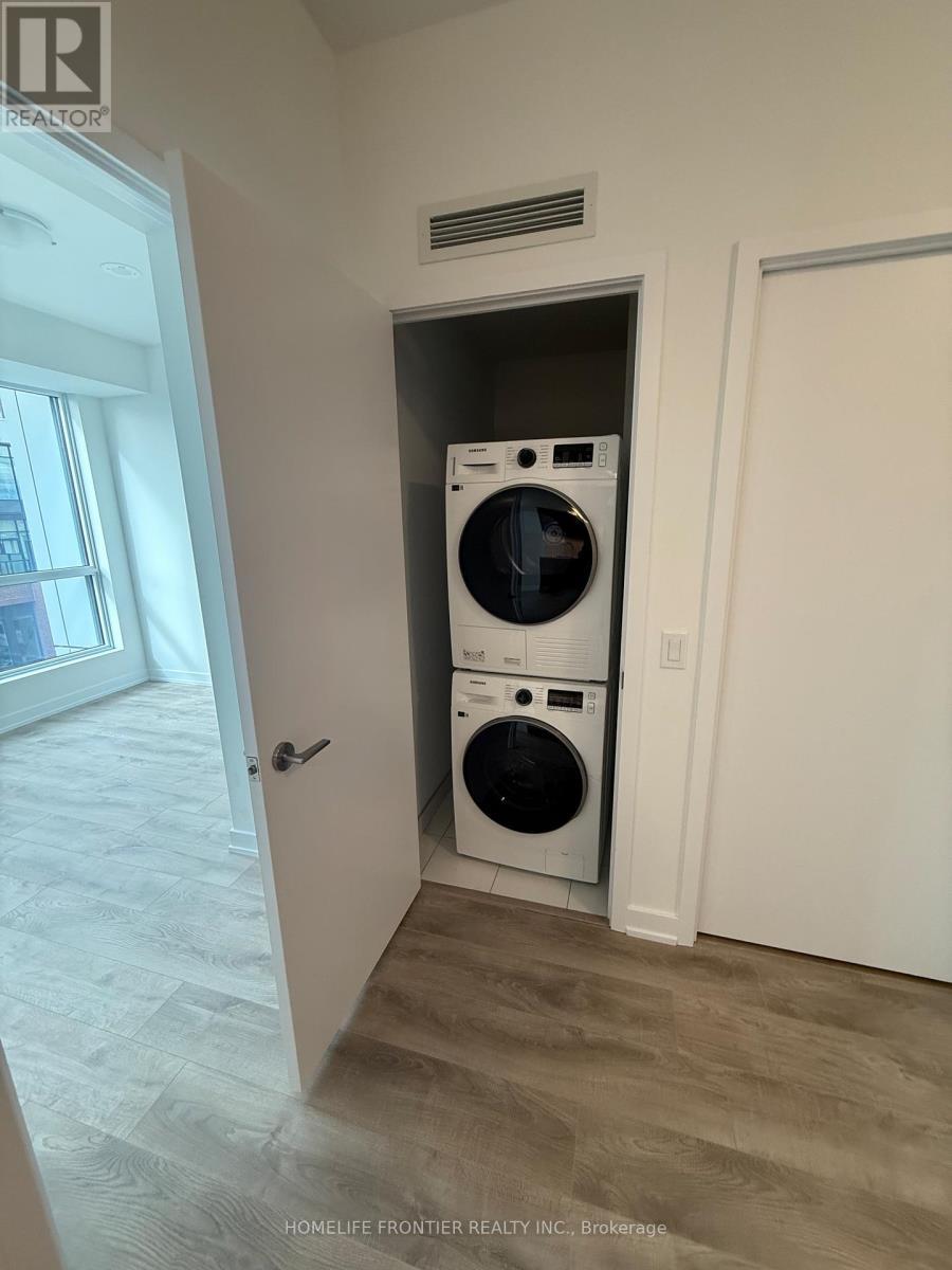 1317 - 15 Richardson Street W, Toronto, ON - Indoor Photo Showing Laundry Room