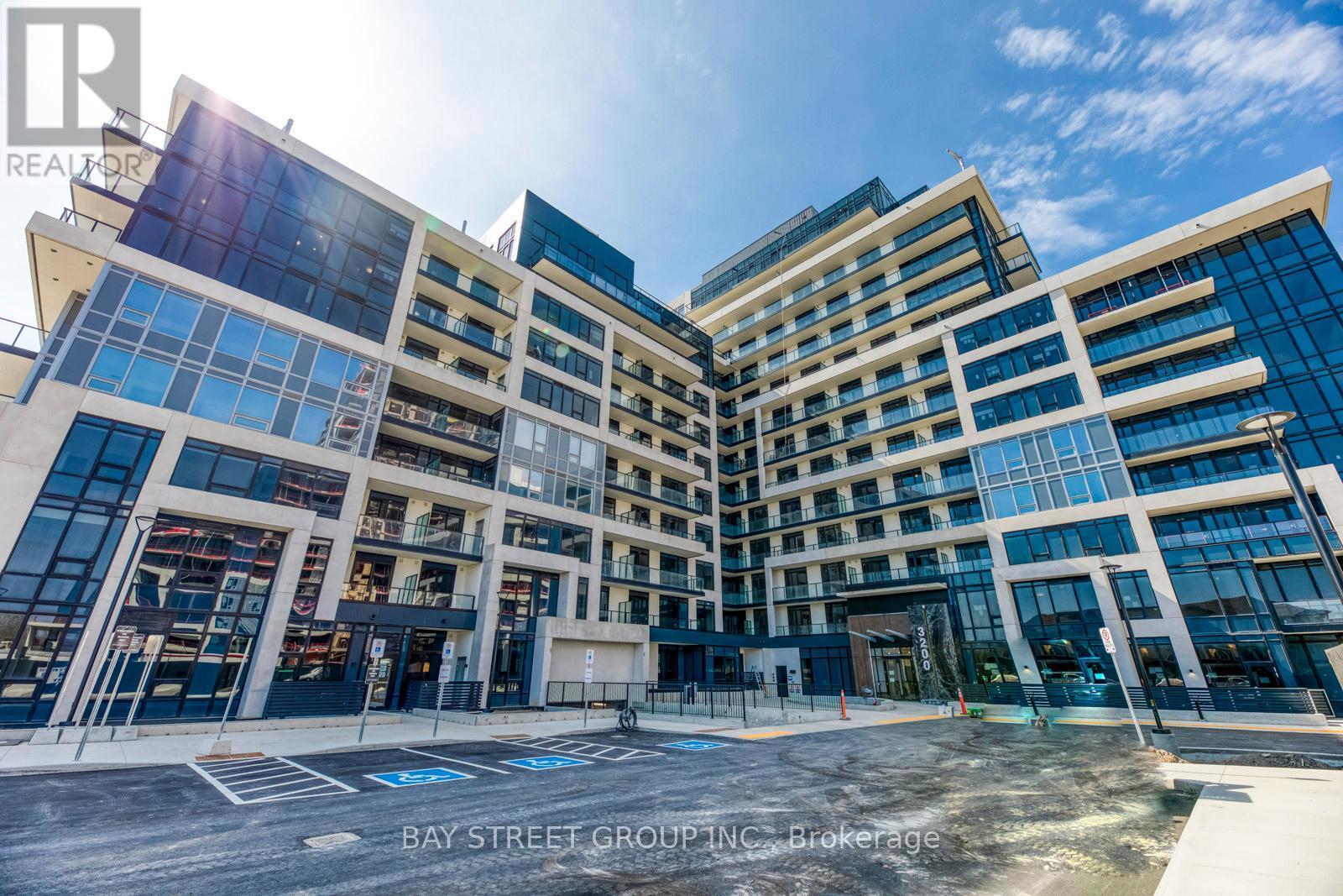 204 - 3200 William Coltson Avenue, Oakville, ON - Outdoor With Facade