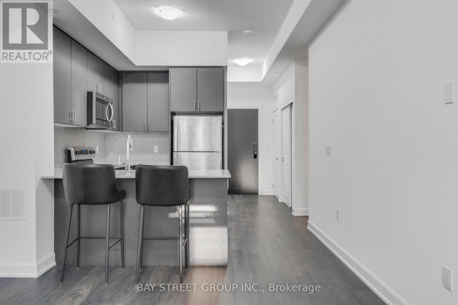 204 - 3200 William Coltson Avenue, Oakville, ON - Indoor Photo Showing Kitchen With Stainless Steel Kitchen