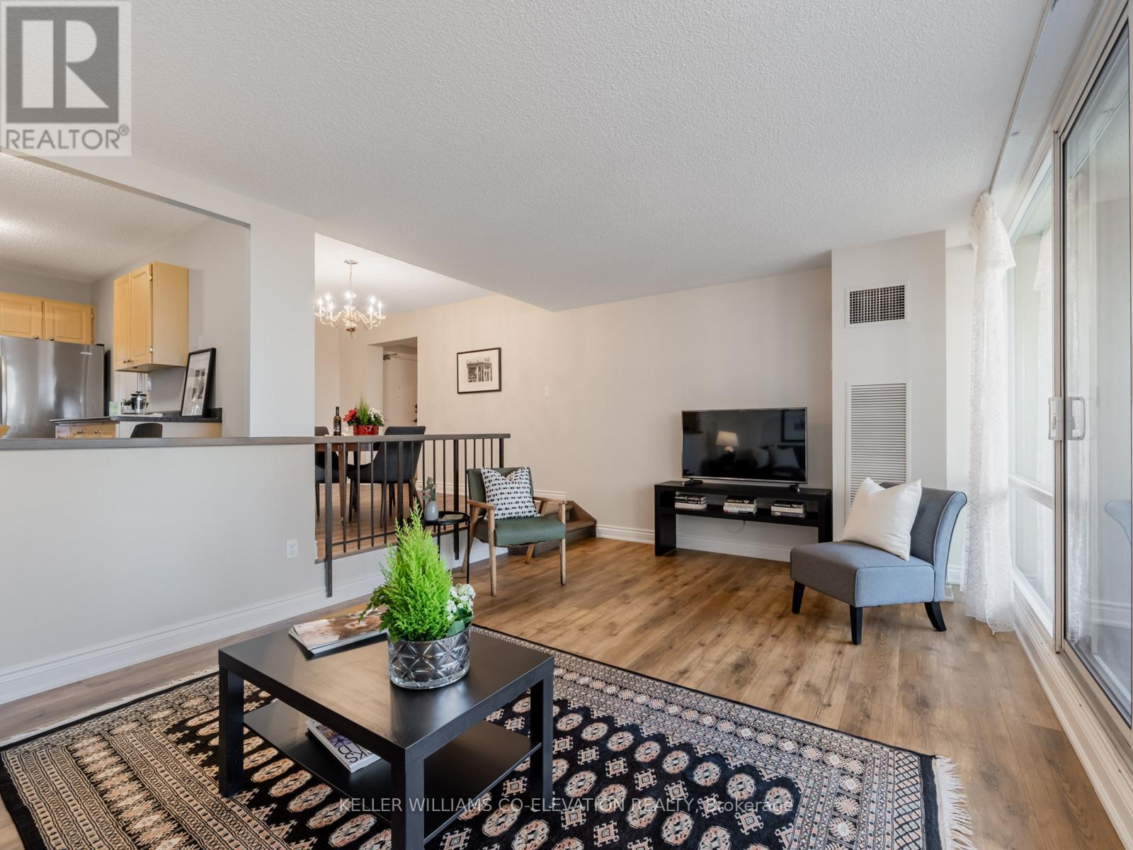 Over 18 Feet Between You & Your BIG Screen! - 709 - 240 Scarlett Road, Toronto, ON - Indoor Photo Showing Living Room