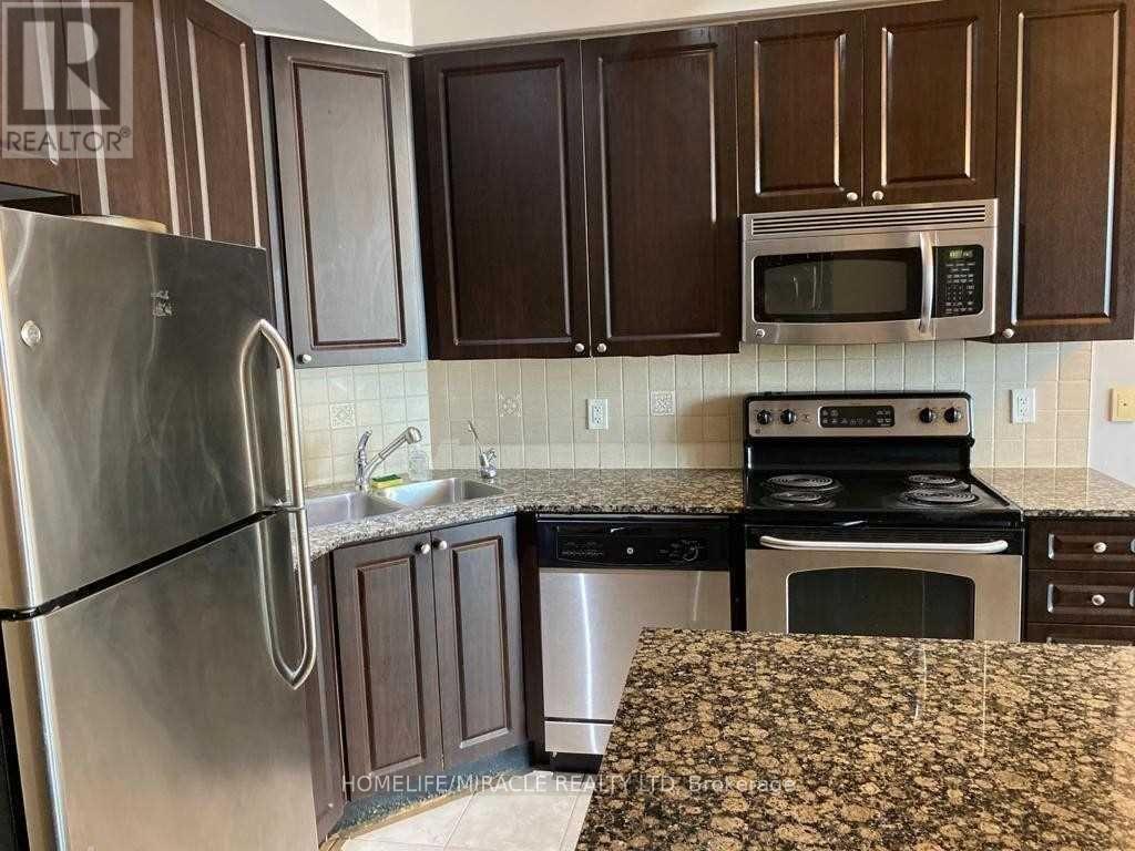 407 - 225 Webb Drive, Mississauga, ON - Indoor Photo Showing Kitchen With Stainless Steel Kitchen