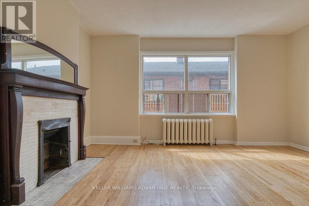 24 Indian Road Crescent, Toronto, ON - Indoor With Fireplace