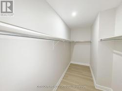 Primary Bedroom Walk-In Closet -
