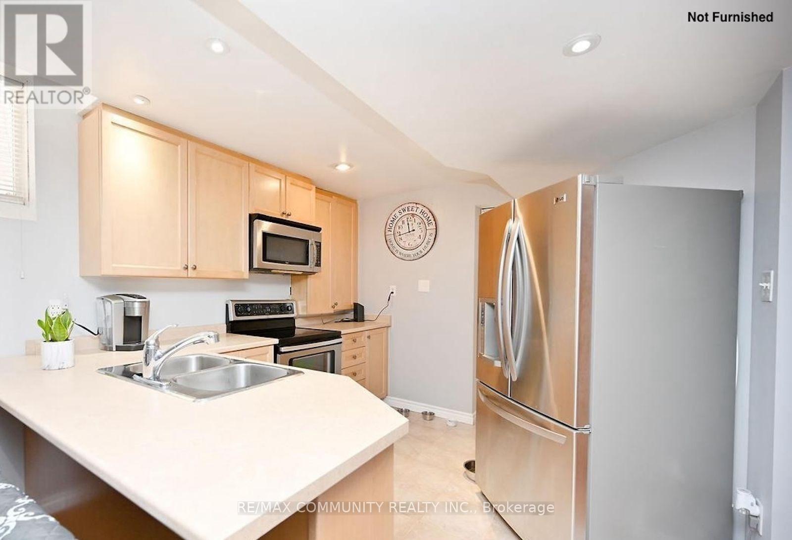 13 Marotta Avenue, Brampton, ON - Indoor Photo Showing Kitchen With Double Sink
