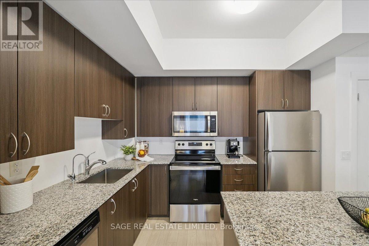 203 - 56 Coles Avenue, Vaughan, ON - Indoor Photo Showing Kitchen With Upgraded Kitchen