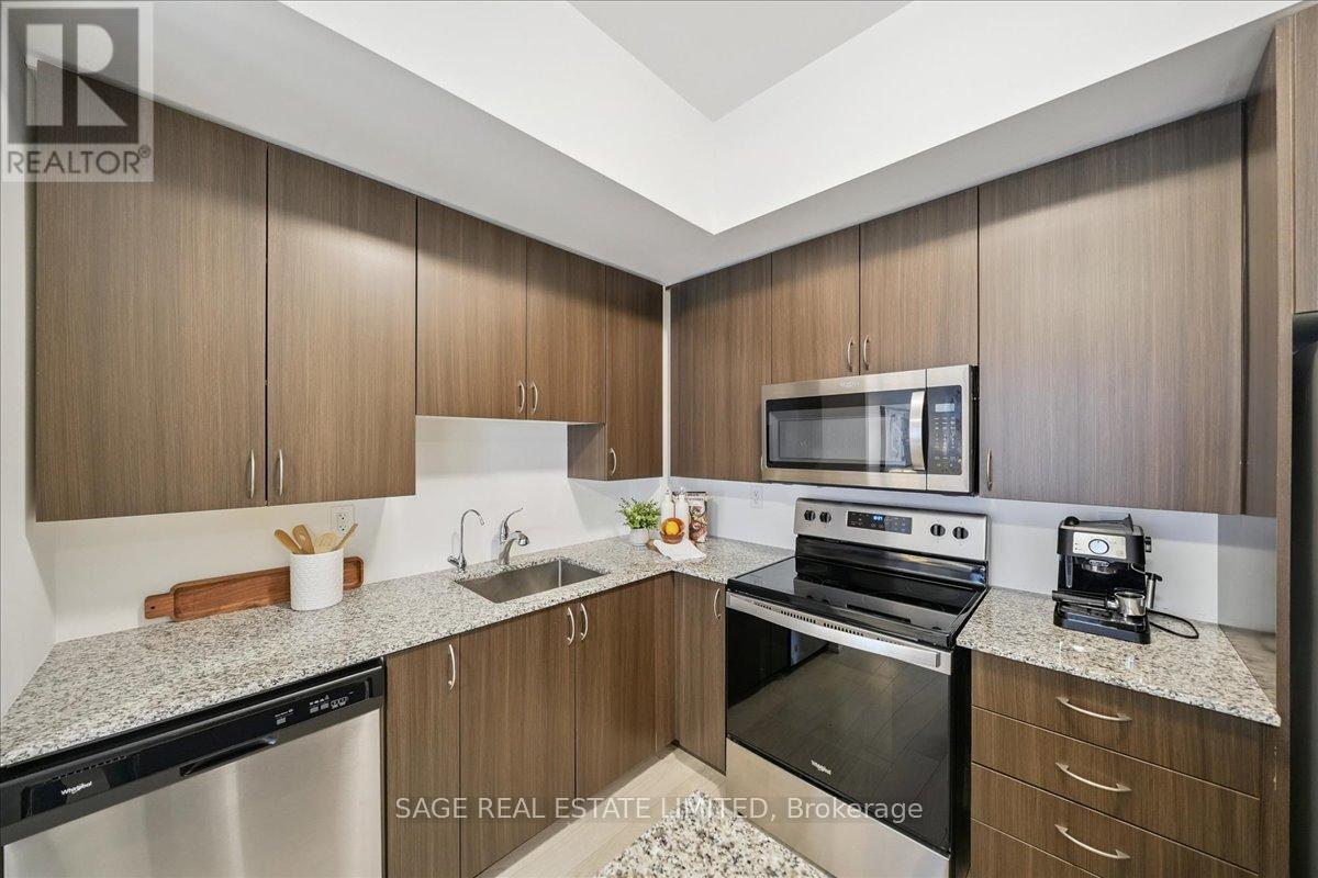203 - 56 Coles Avenue, Vaughan, ON - Indoor Photo Showing Kitchen With Upgraded Kitchen