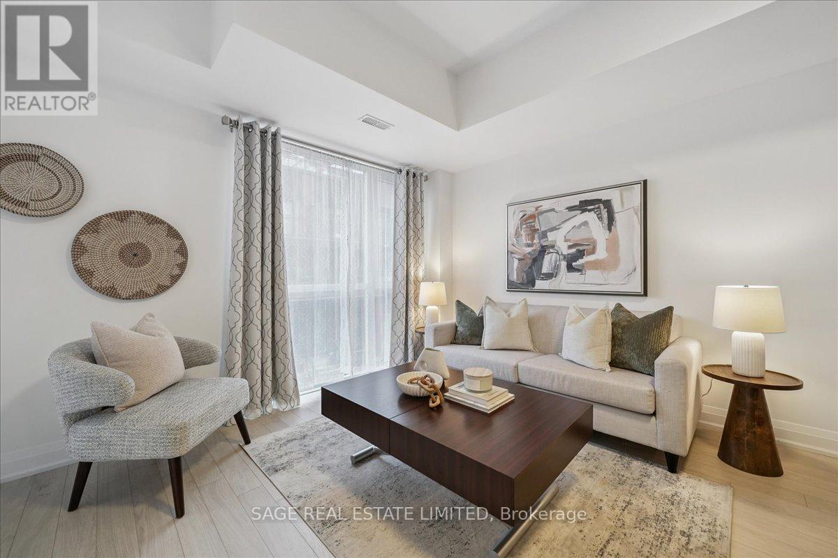 203 - 56 Coles Avenue, Vaughan, ON - Indoor Photo Showing Living Room