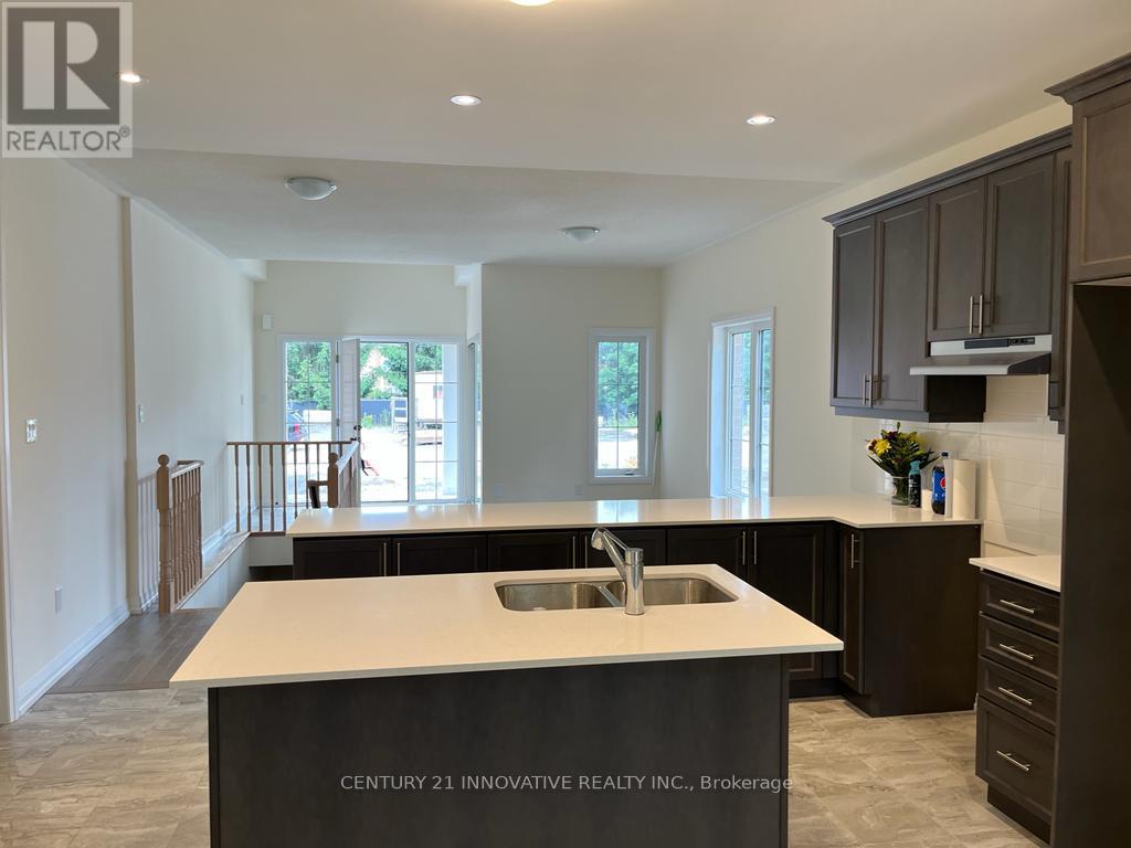 22 Holtby Court S, Scugog, ON - Indoor Photo Showing Kitchen With Double Sink