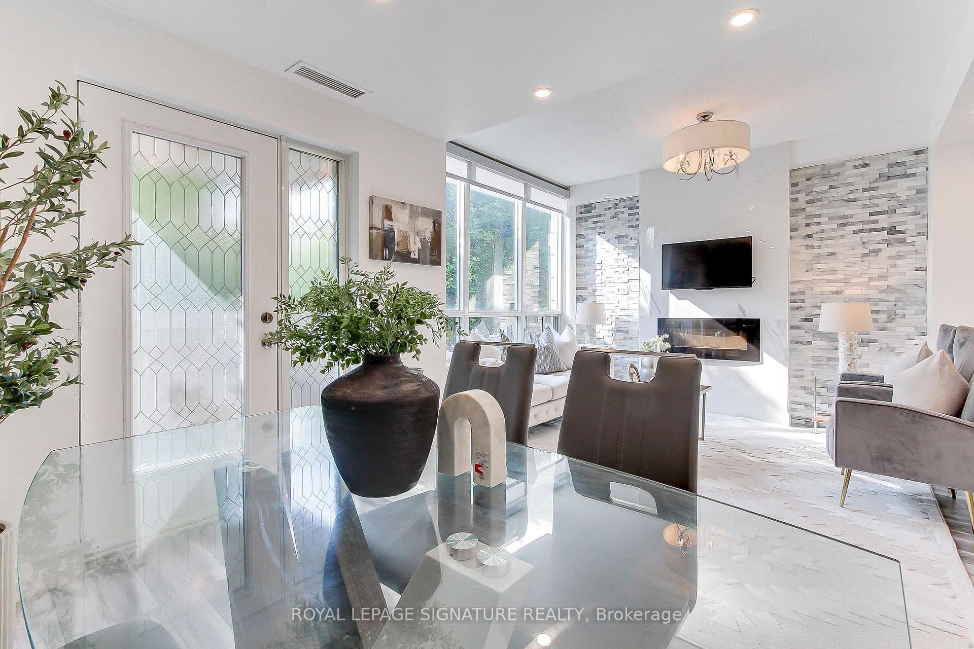 Th-104-90 Absolute Avenue, Mississauga, ON - Indoor With Fireplace