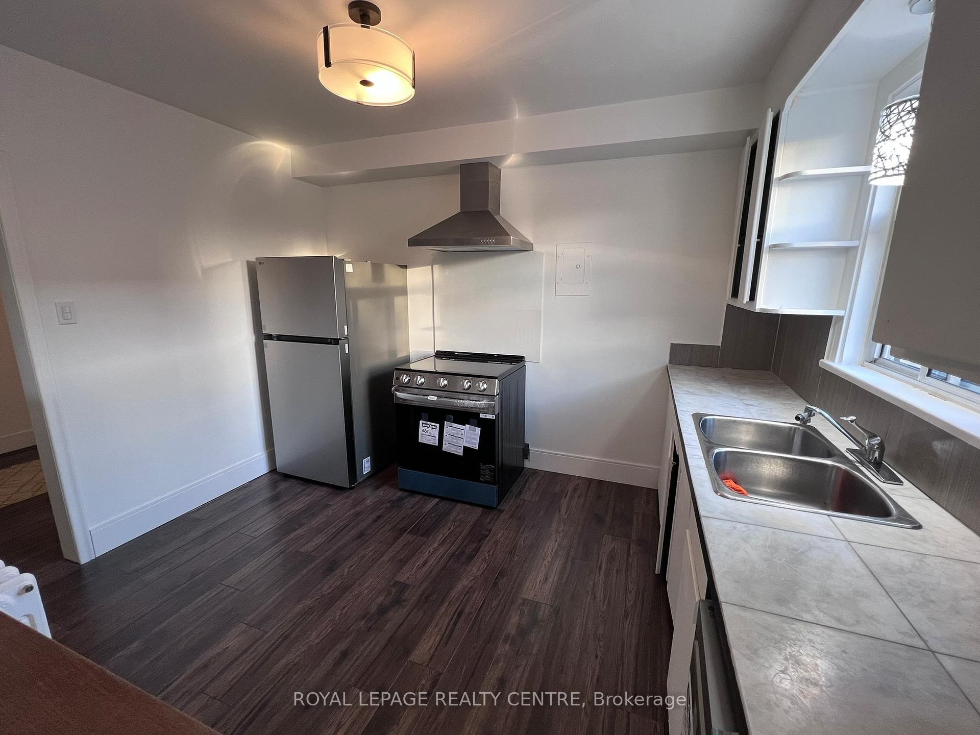 1-3351 Lake Shore Boulevard W, Toronto, ON - Indoor Photo Showing Kitchen With Double Sink