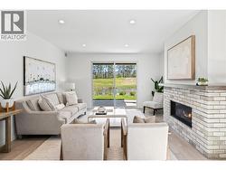 Living Room - Photo of a similar home in the community. -