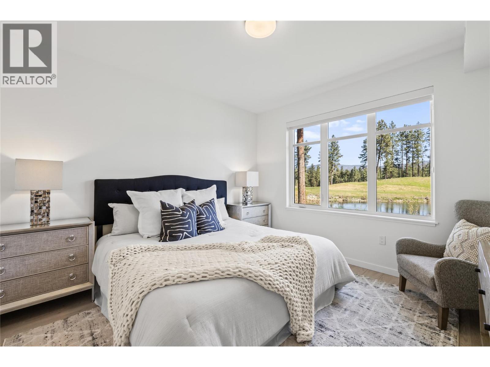 Primary - Photo of a similar home in the community. - 1979 Country Club Drive Unit# 7, Kelowna, BC - Indoor Photo Showing Bedroom