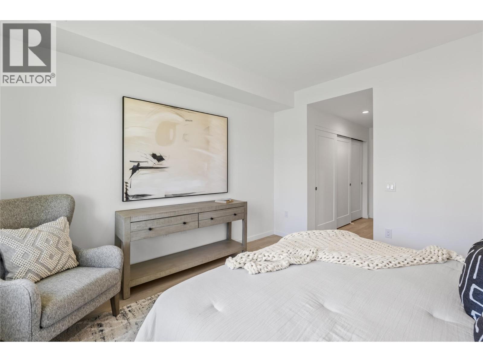 Primary - Photo of a similar home in the community. - 1979 Country Club Drive Unit# 7, Kelowna, BC - Indoor Photo Showing Bedroom