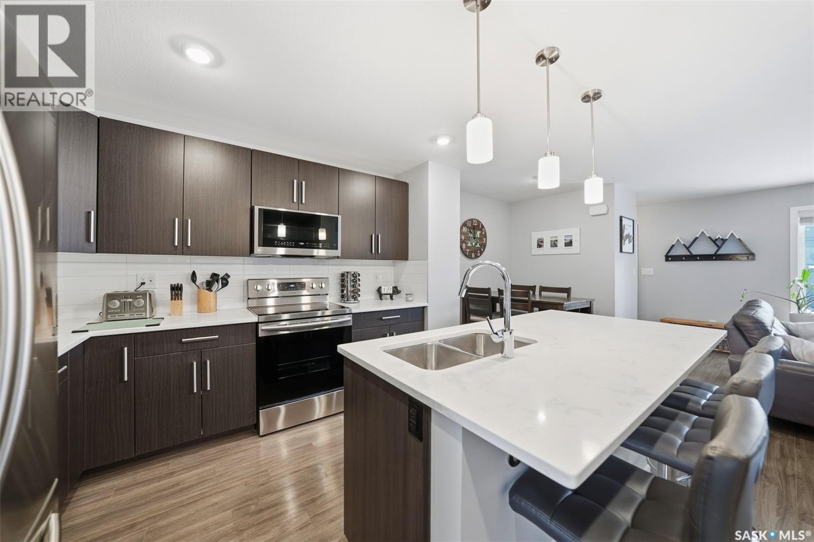 4018 Brighton Circle, Saskatoon, SK - Indoor Photo Showing Kitchen With Double Sink With Upgraded Kitchen