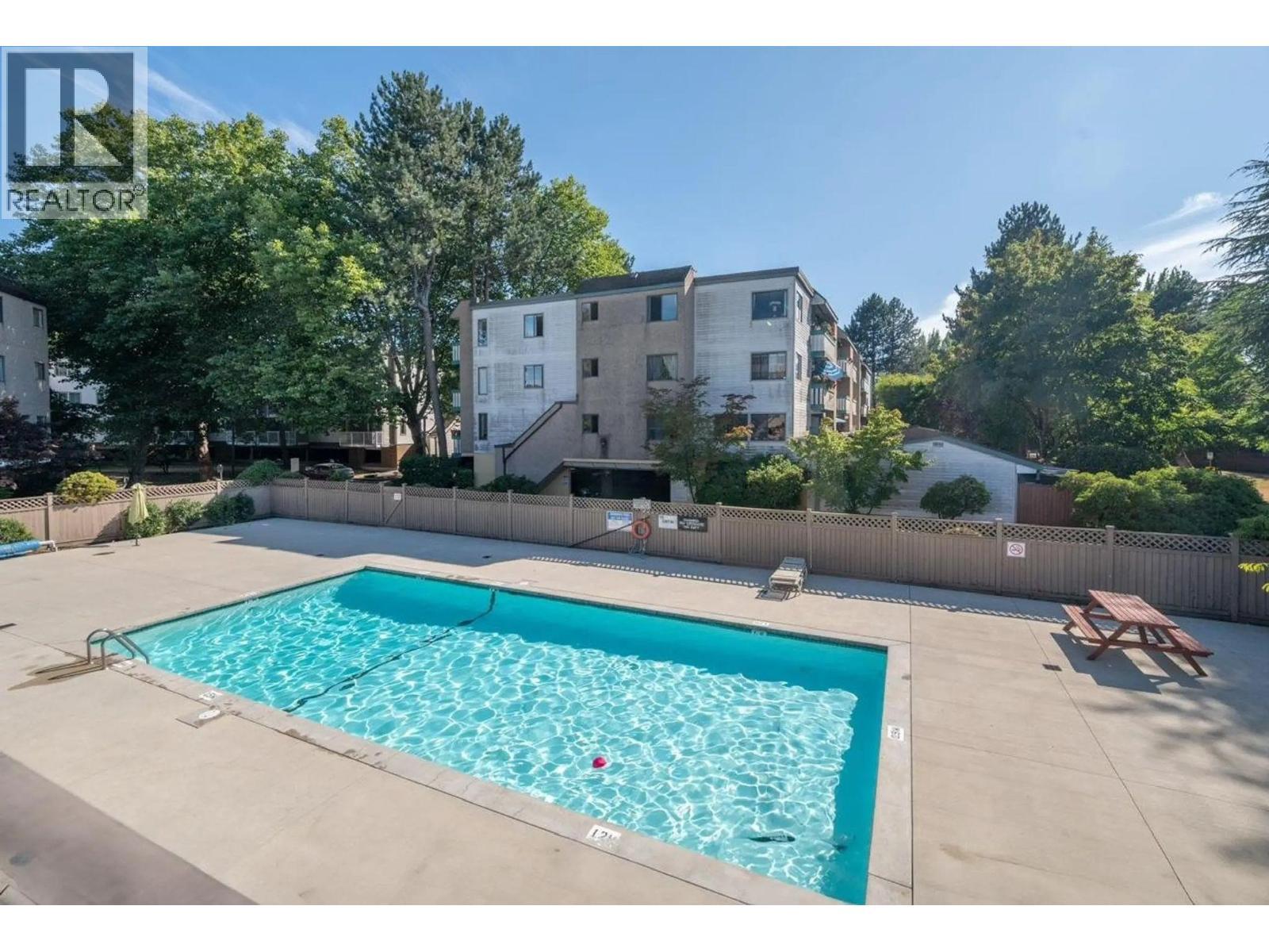 312 8900 Citation Drive, Richmond, BC - Outdoor With In Ground Pool With Backyard