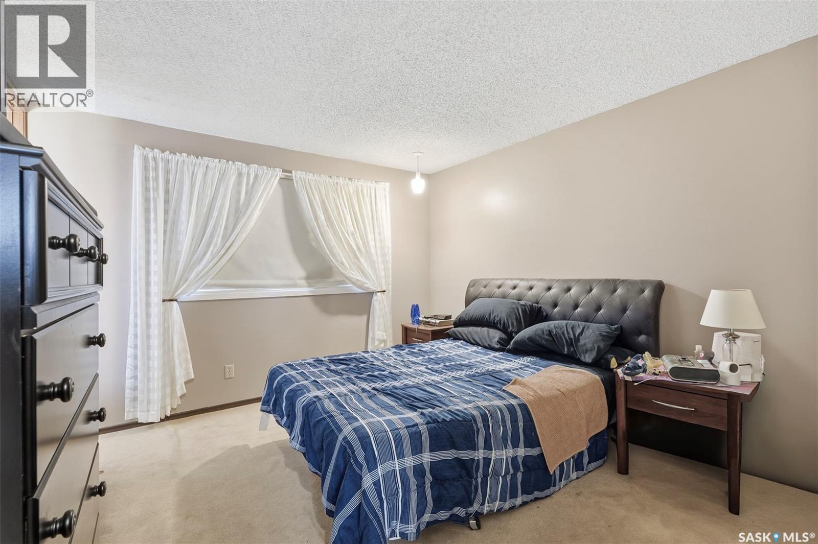 227 Sylvian Way, Saskatoon, SK - Indoor Photo Showing Bedroom
