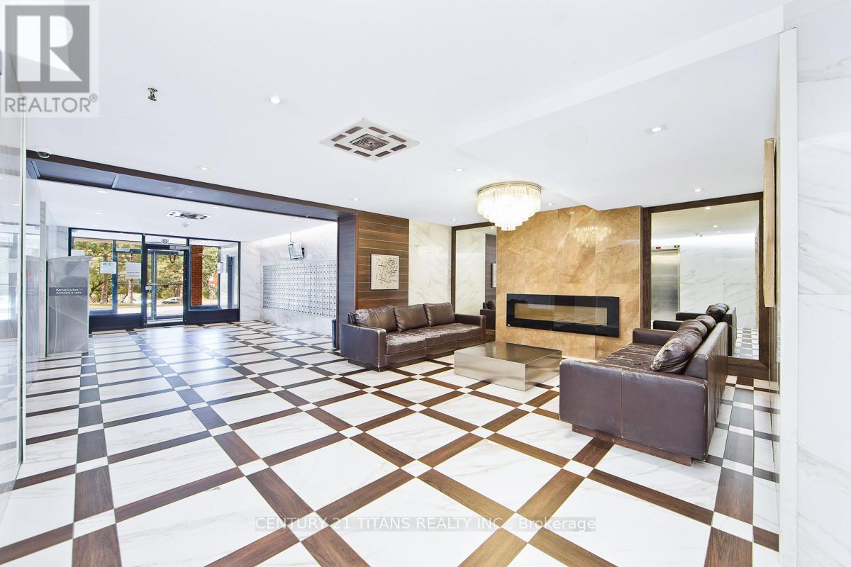 201 - 100 Wingarden Court, Toronto, ON - Indoor With Fireplace