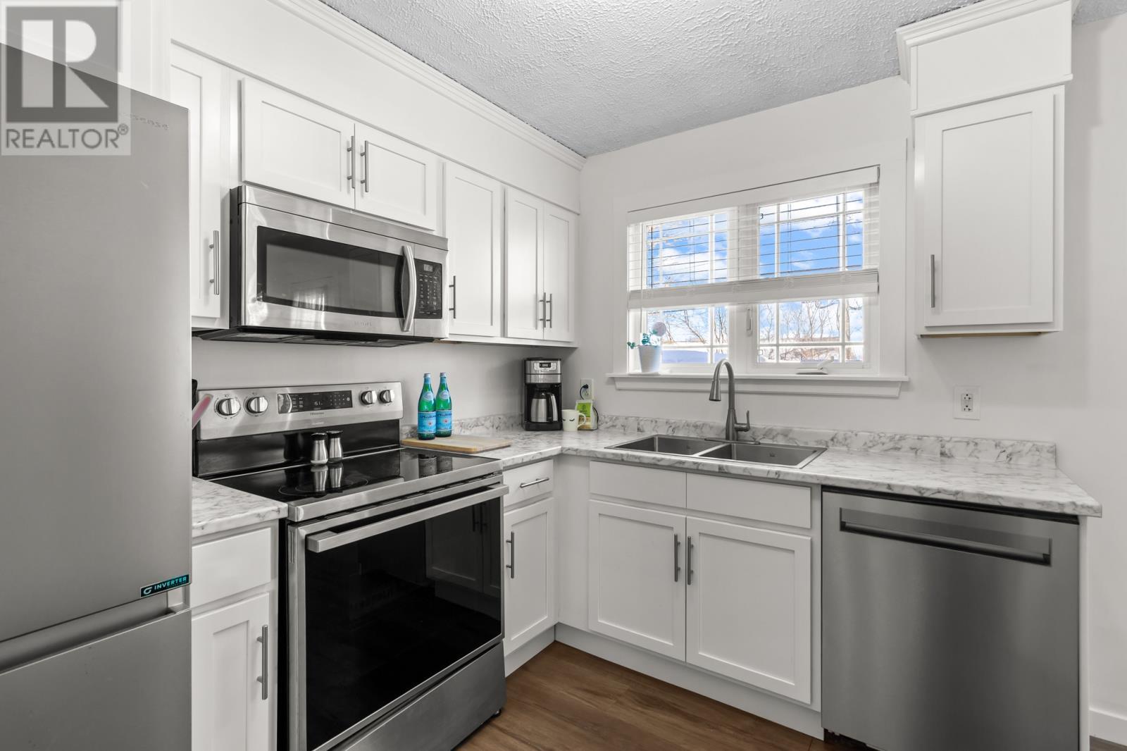 58 Fourth Street, Mount Pearl, NL - Indoor Photo Showing Kitchen With Double Sink