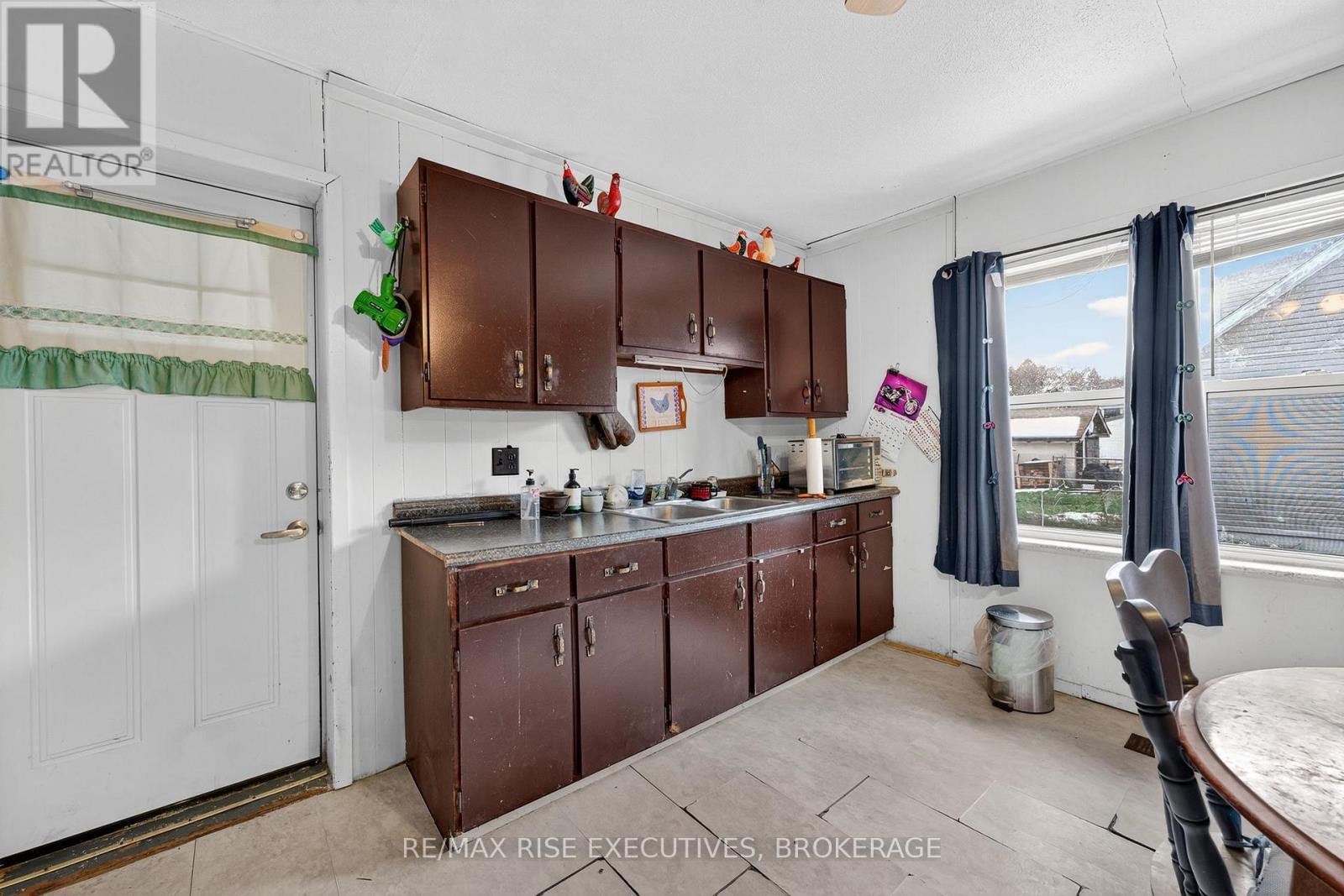 6862 Highway 38, Frontenac (Frontenac South), ON - Indoor Photo Showing Kitchen With Double Sink