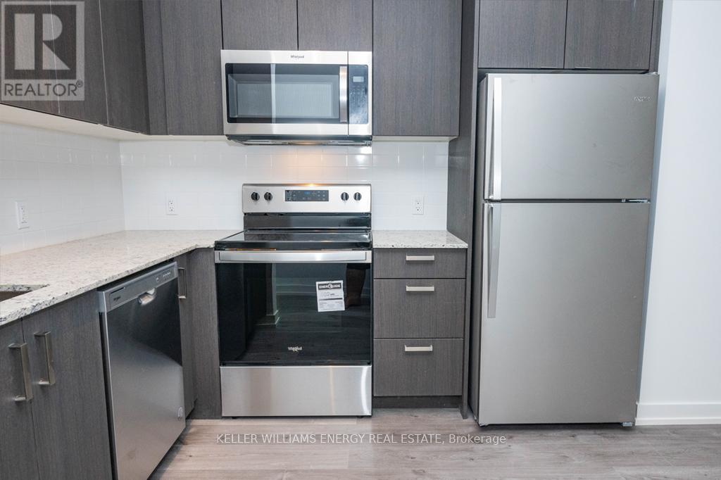 112 - 1010 Dundas Street E, Whitby (Pringle Creek), ON - Indoor Photo Showing Kitchen With Stainless Steel Kitchen