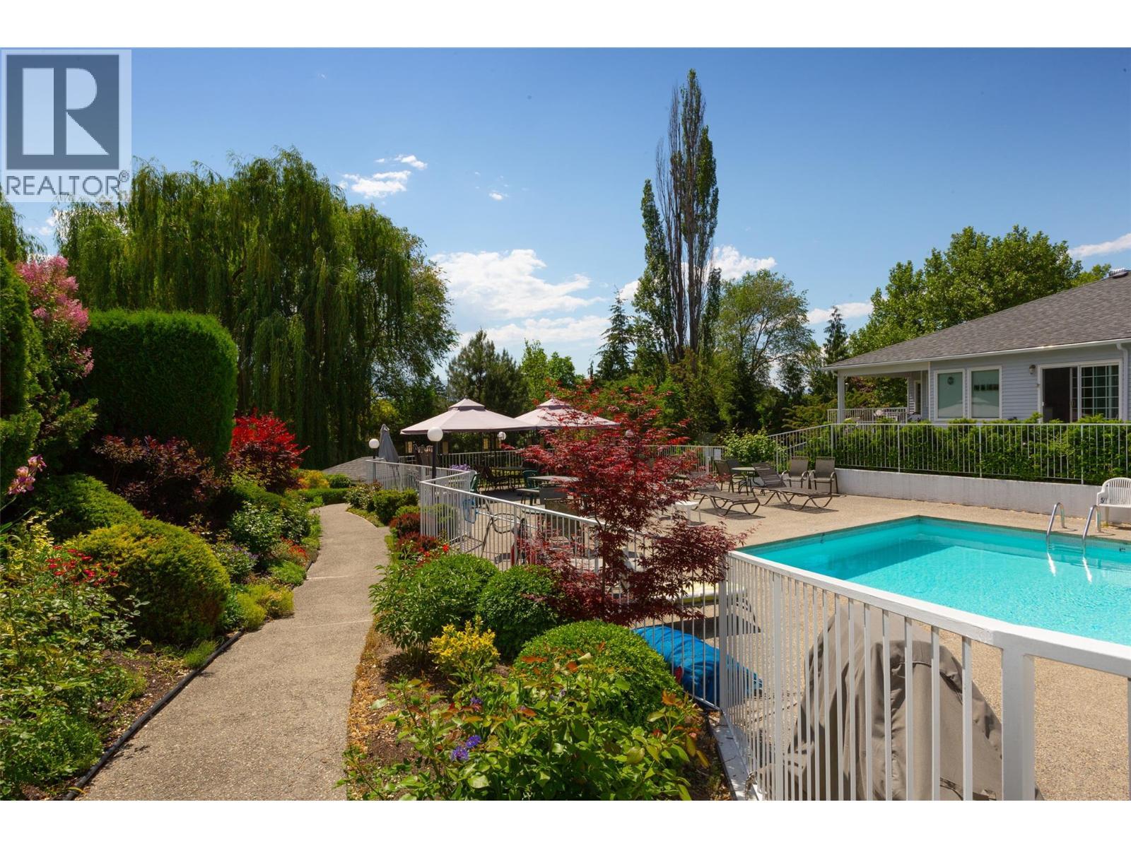 1101 Cameron Avenue Unit# 60, Kelowna, BC - Outdoor With In Ground Pool
